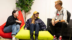 Students socialising on colourful beanbags