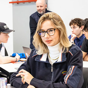 Students studying in lecture group work