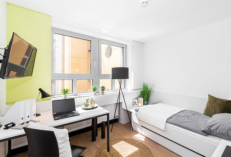 Bedroom with TV and study table