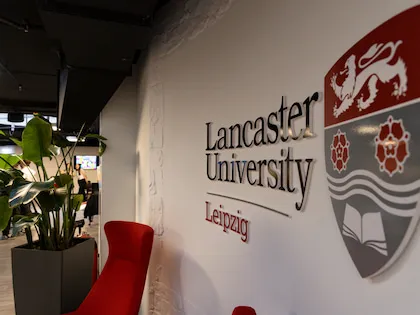 Lancaster university leipzig logo printed on wall